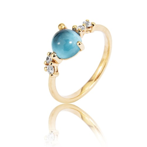 Gouden ring met blauwe topaas