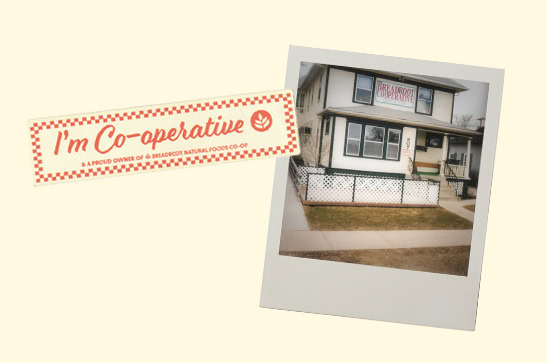 A vintage Polaroid of Breadroot Co-op’s original storefront in Rapid City, South Dakota, alongside a red sticker reading “I’m Co-operative.” 