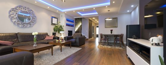 Modern gypsum tray ceiling with LED cove lighting and recessed spotlights