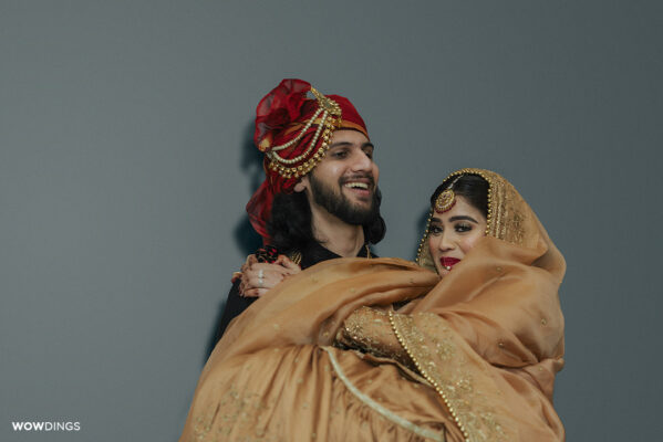 Groom carrying a Bride Home at a Muslim Wedding in Delhi