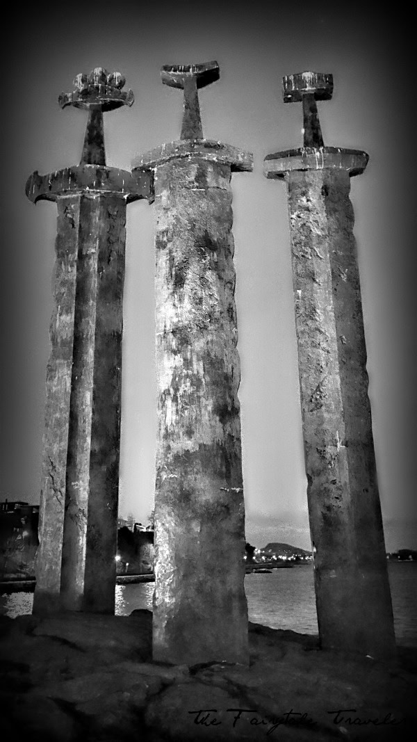 Stavanger Iron Age Farm and Three Swords Viking Monument 9 A black and white of the Three Swords Monument. Which stands about 33 feet tall.