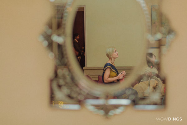 a wedding guest reflection photographed in kolkata taj hotek