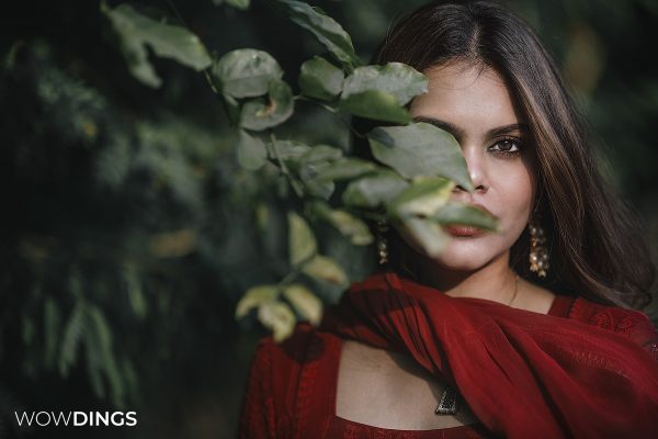 Girl wearing red with green combination creative shoot