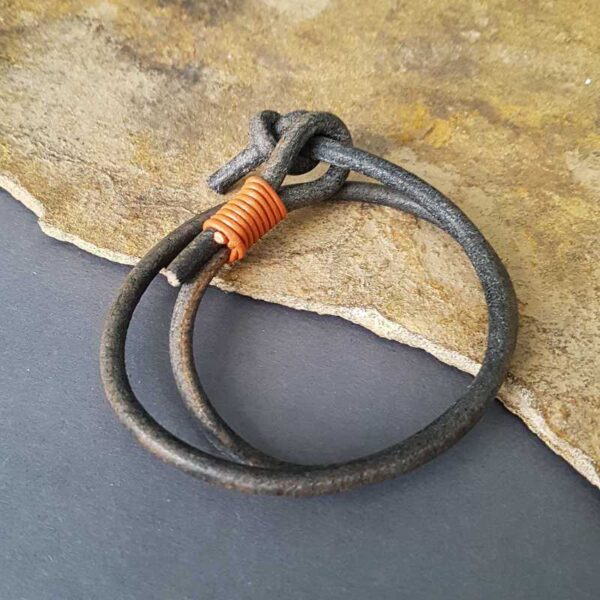 Rustic leather bracelet in grey and contrasting orange