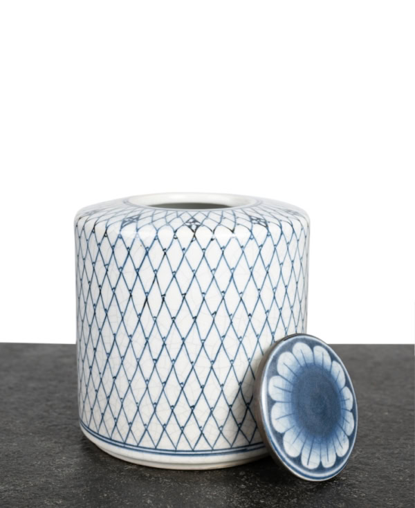 cannister shaped blue and white ceramic container with brass trim with the lid open from Mulberry Home India