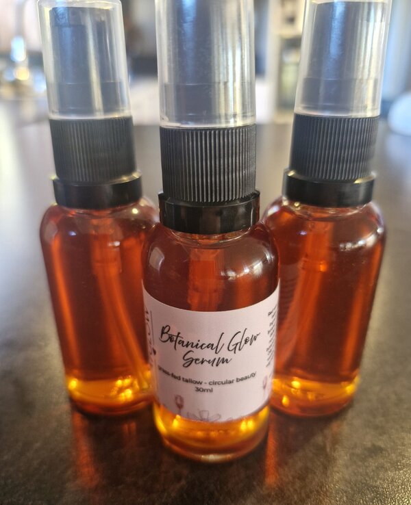 Botanical Glow Serum by Fatglow - 30ml glass bottle with pump, grass-fed tallow and circular beauty serum handcrafted in Taranaki, New Zealand