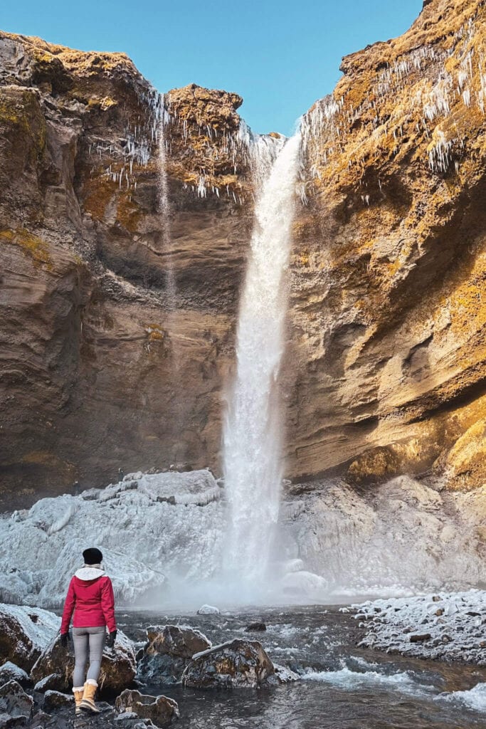 Me standing next to Kvernufoss waterfall