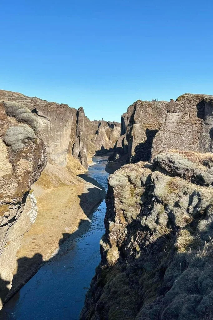 The start of the hike to Fjaðrárgljúfur Canyon in Iceland - you can see people on one of the viewpoints