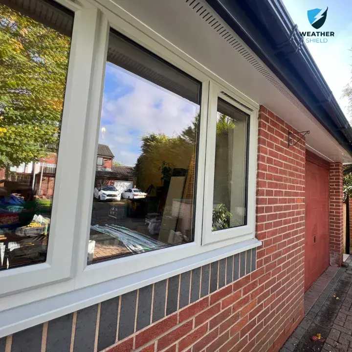 white framed casement window