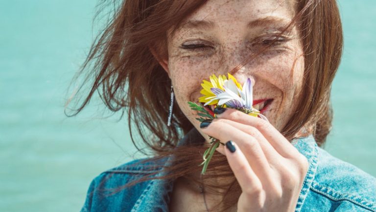 genetic sensitivity to scent, girl smelling flower