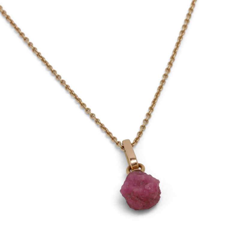 Red gold necklace with a rough ruby
