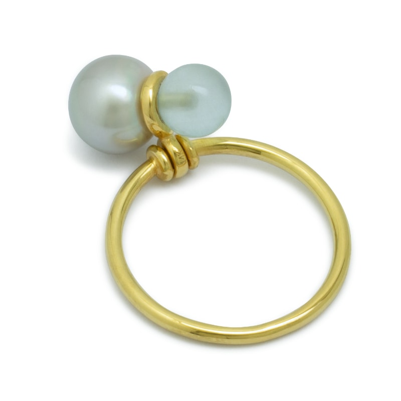 Yellow golden Danza ring with pearl and blue topaz