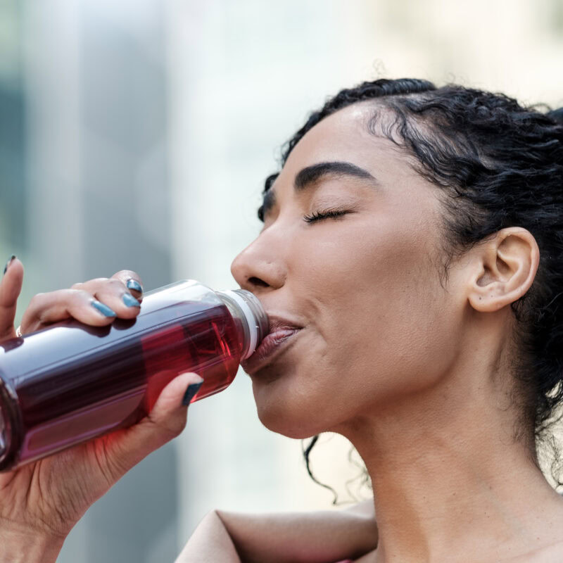 Functional Electrolyte Market Trends and Growth article title banner featuring a women drinking a healthy beverage