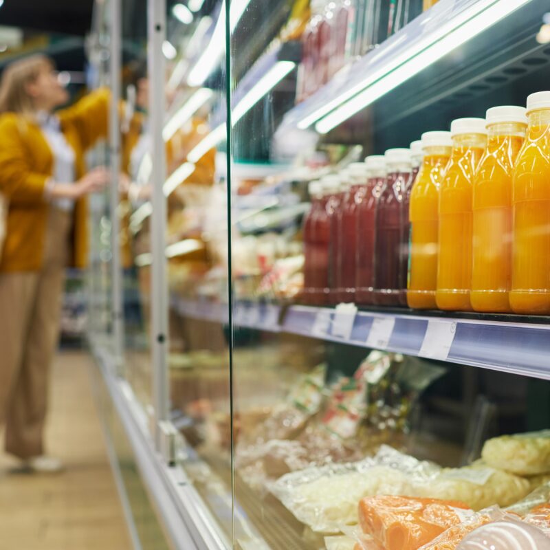 What Are the Marketing Guidelines for Healthy Food Product Claims? article banner featuring woman shopping for healthy food at a grocery store