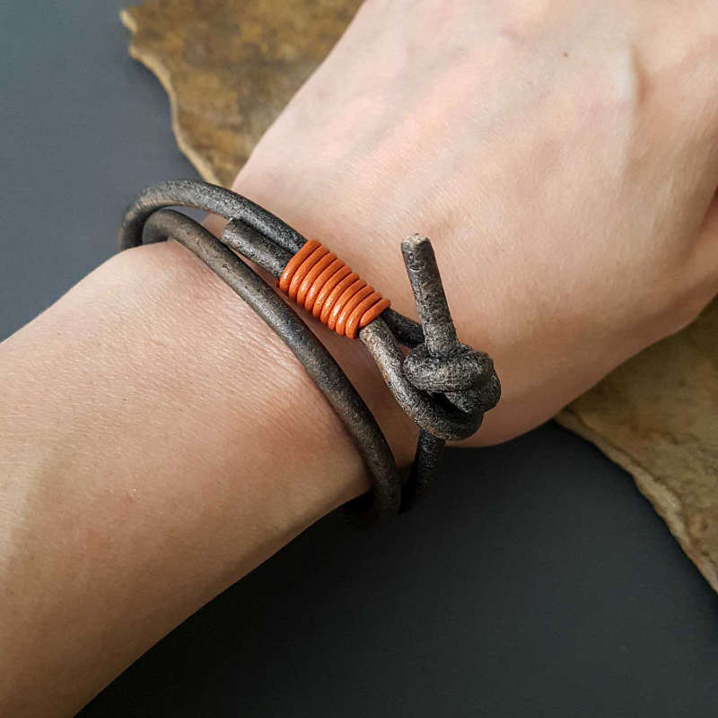 Rustic leather bracelet in grey and contrasting orange
