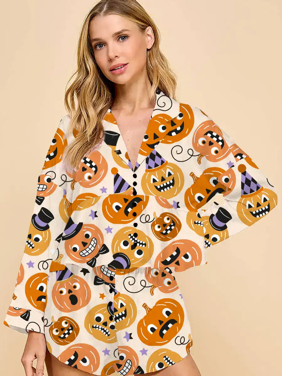 Milky White Halloween loungewear set with long balloon sleeves and a trendy front-tie closure, matching shorts, scattered pumpkin and spiderweb print, chic and relaxed silhouette.