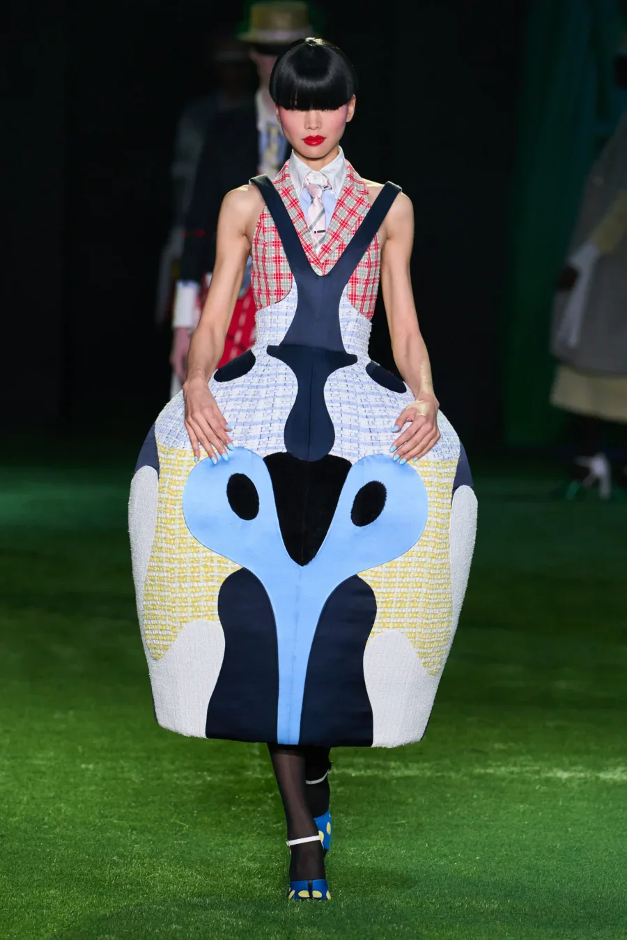 Thom Browne Spring 2027 womenswear runway look during New York Fashion Week.