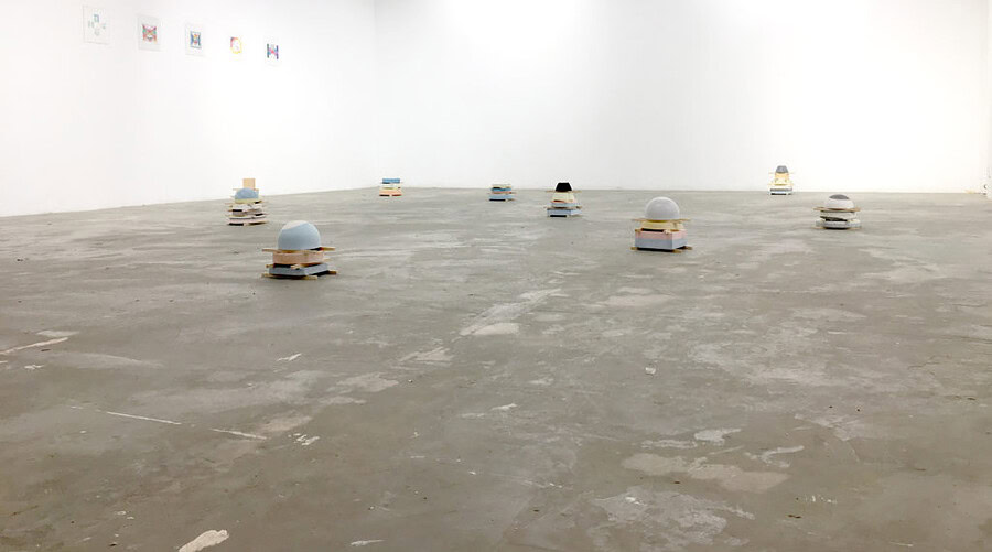 CLAIRE EBENDINGER, ”PIÈCES MONTÉES - DÉMONTÉES” [STACKING CAKES], PIGMENTED PLASTER, PINE TREE STICKS, VARIABLE DIMENSIONS