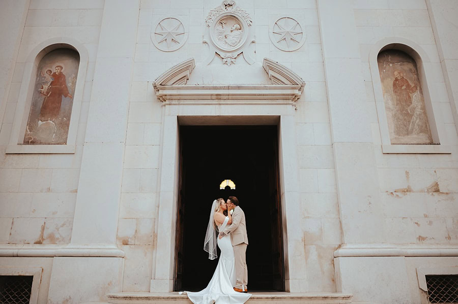 A just married couple outside a church in Cheltenham