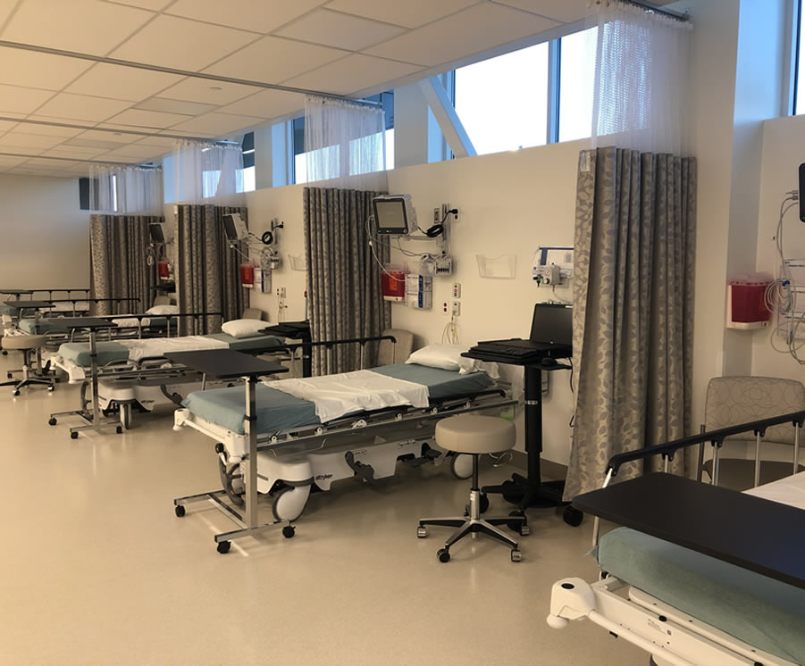 Surgery Center of North Central Ohio clean and organized medical preparation room. Medical prep room with examination table and medical supplies.