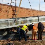 Thumbnail of http://Workers%20inspecting%20a%20metal%20structure%20at%20a%20construction%20site.