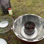 Lotus-Grill mit USB-Anschluss inkl. Pizzastein-Set und Glashaube