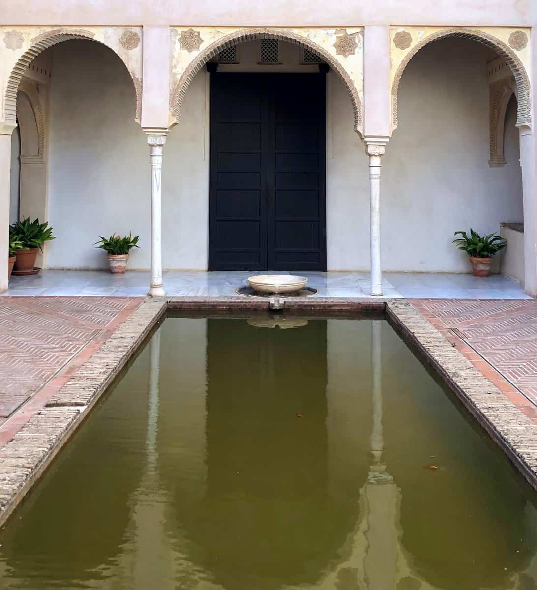 Albaicin Casa Zafra Granada Nasrid Residence Islamic Architecture Pool With Arches And Columns Small Fountain With Plants