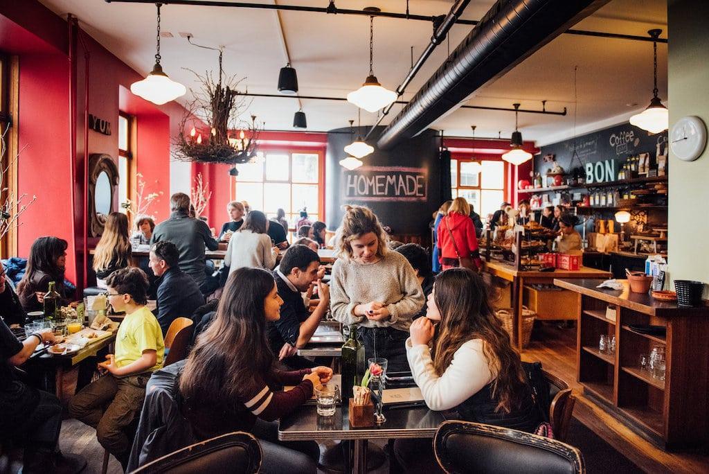 Busy Montreal restaurant filled with customers dining together