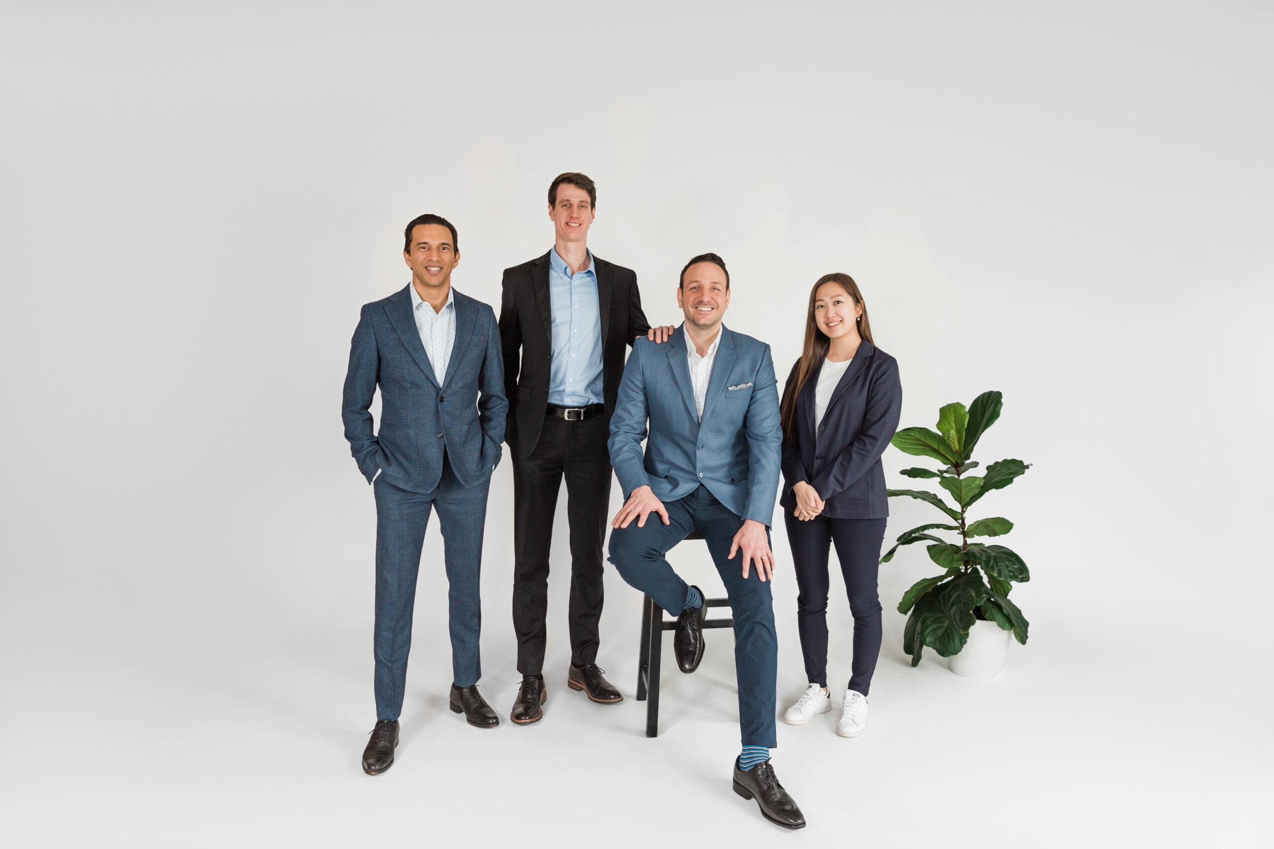 The Safe Pacific Financial team with a clean white background. They are discussing the IRP Insured Retirement Plan for Canadians.