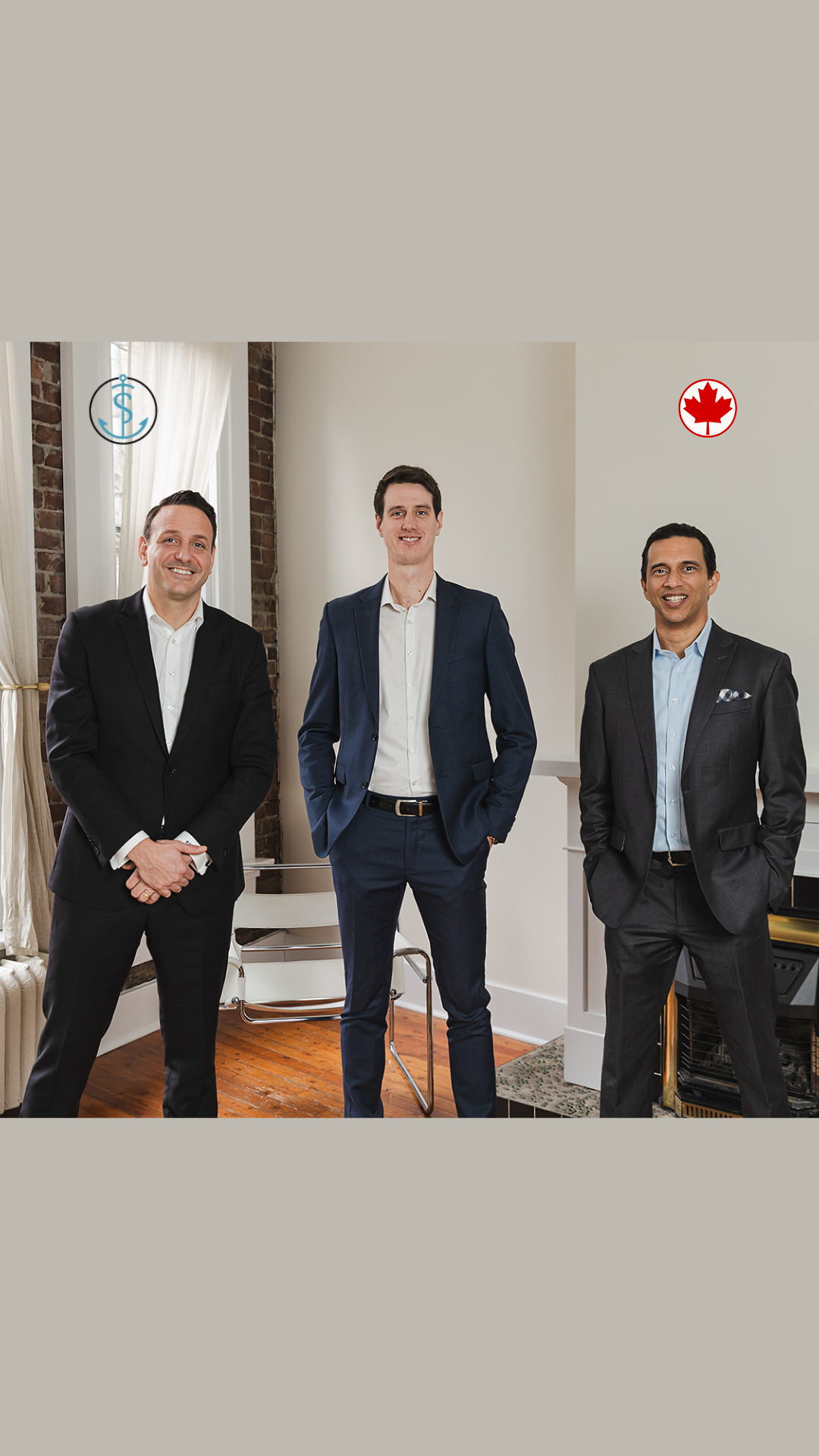 Three business owners in suits stand indoors, smiling at the camera. Two logos—a stylized anchor and a red maple leaf—are above them. The setting features wooden floors, white walls, and a window with curtains, highlighting the importance of life insurance.