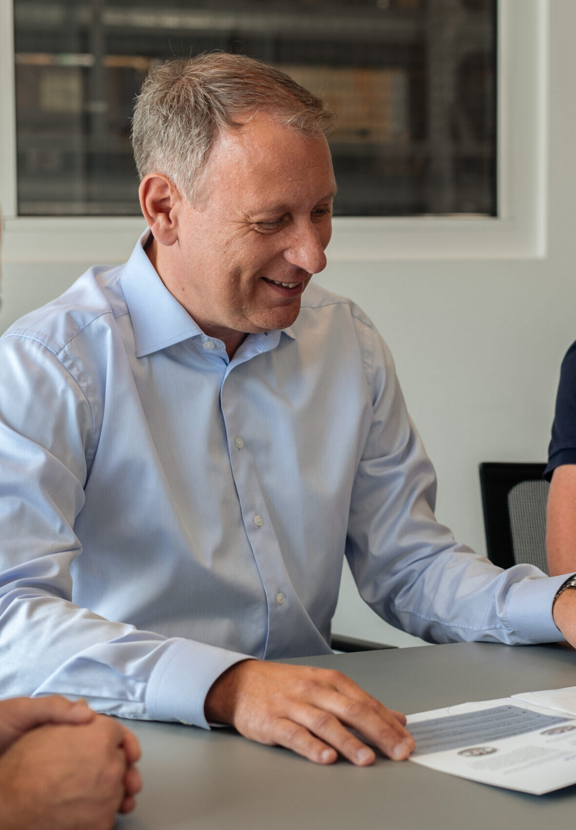 Sintex employees in meeting