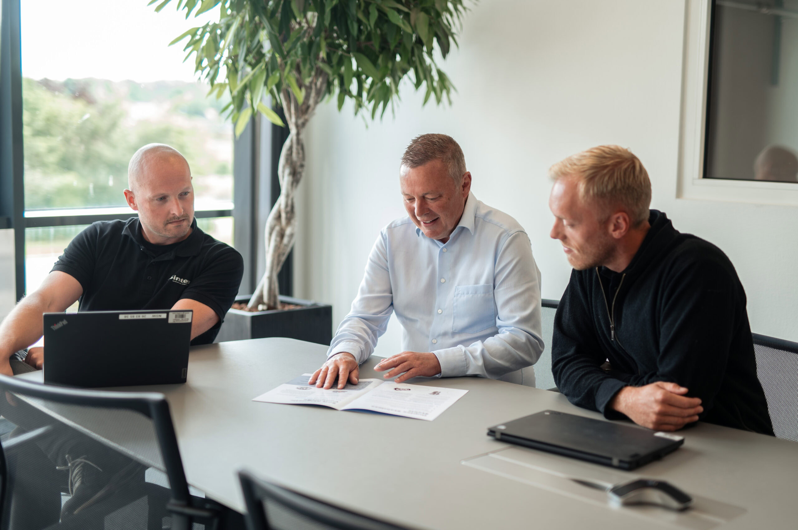 Sintex employees in meeting