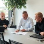 Sintex employees in meeting