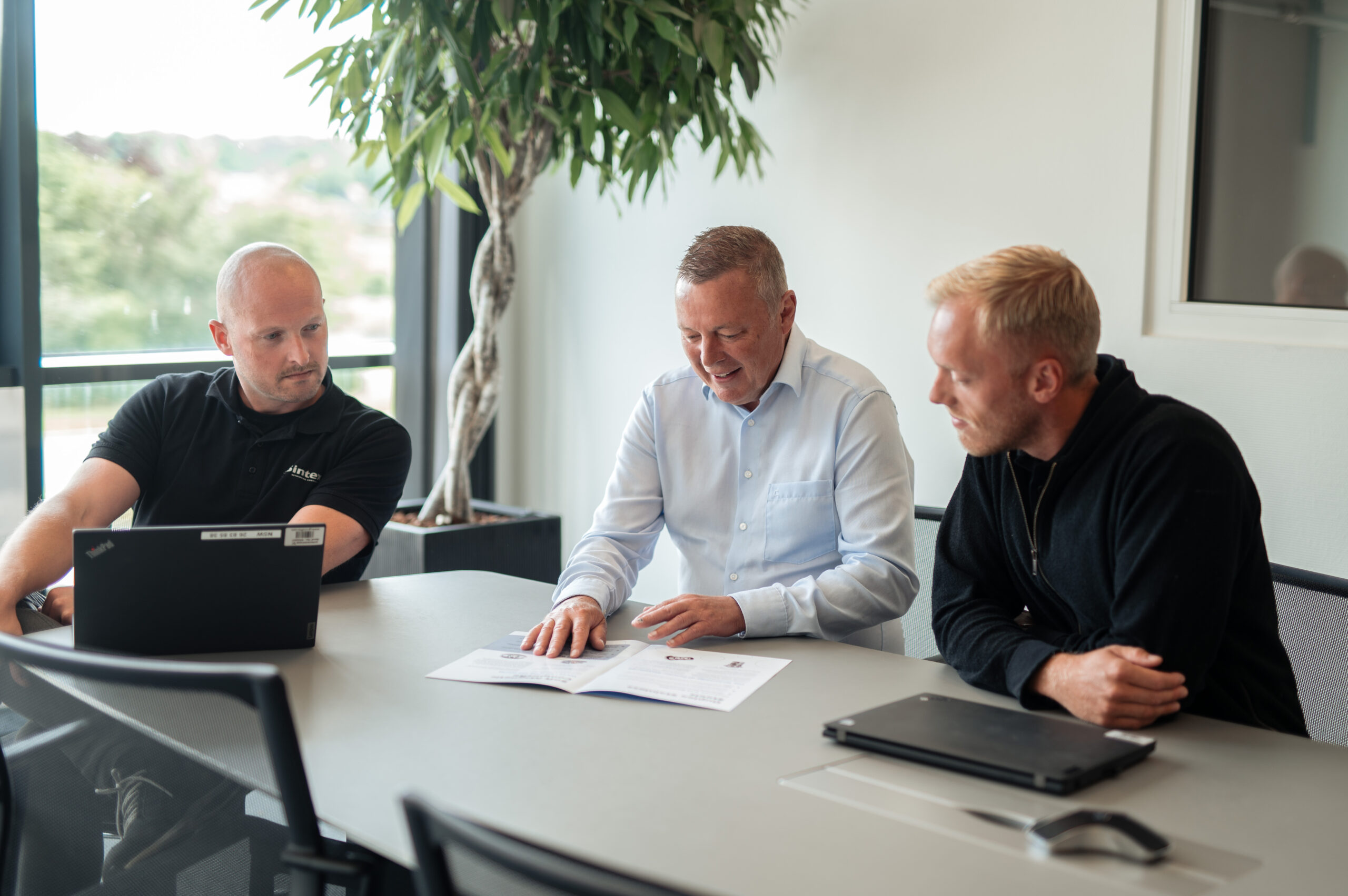 Sintex employees in meeting