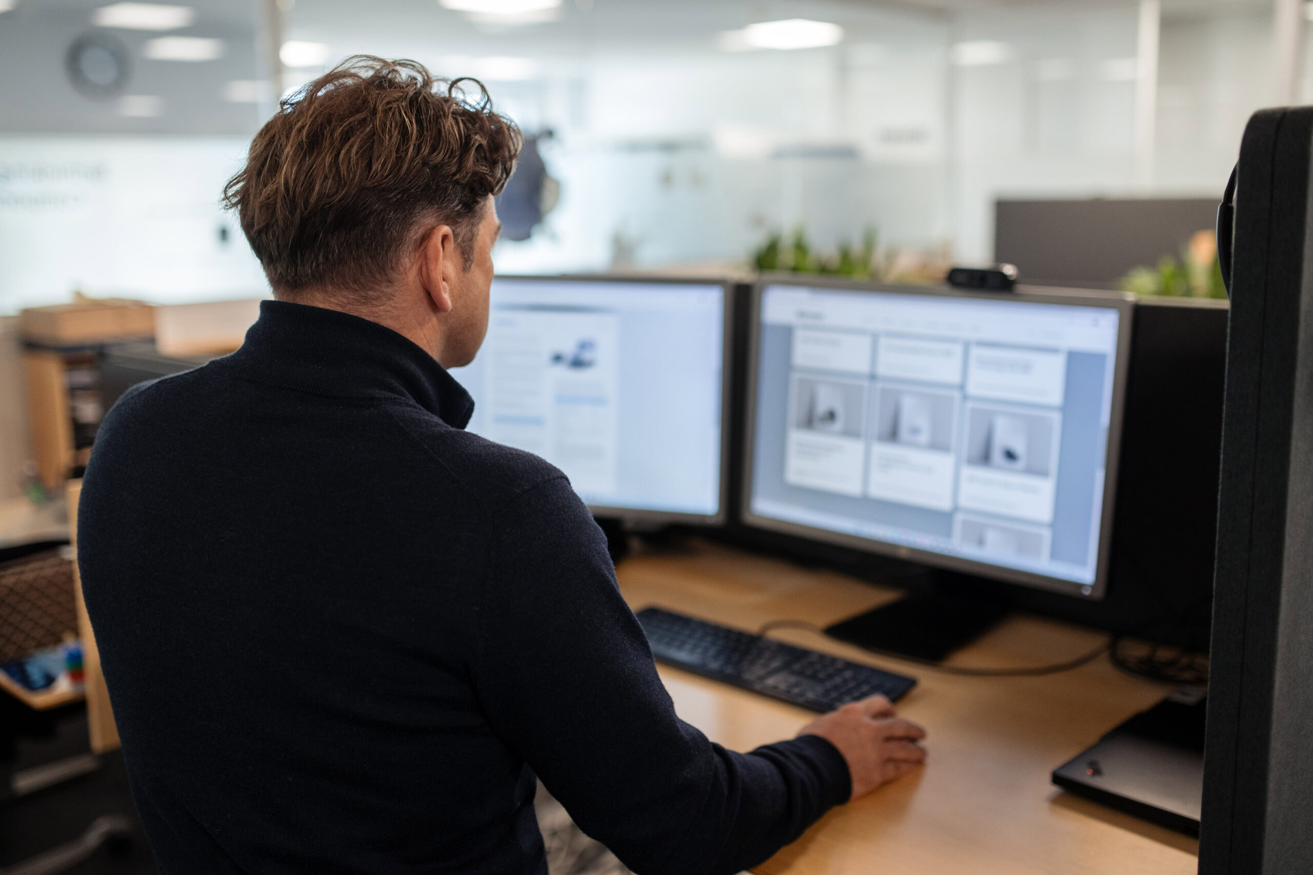 Sintex employee at computer