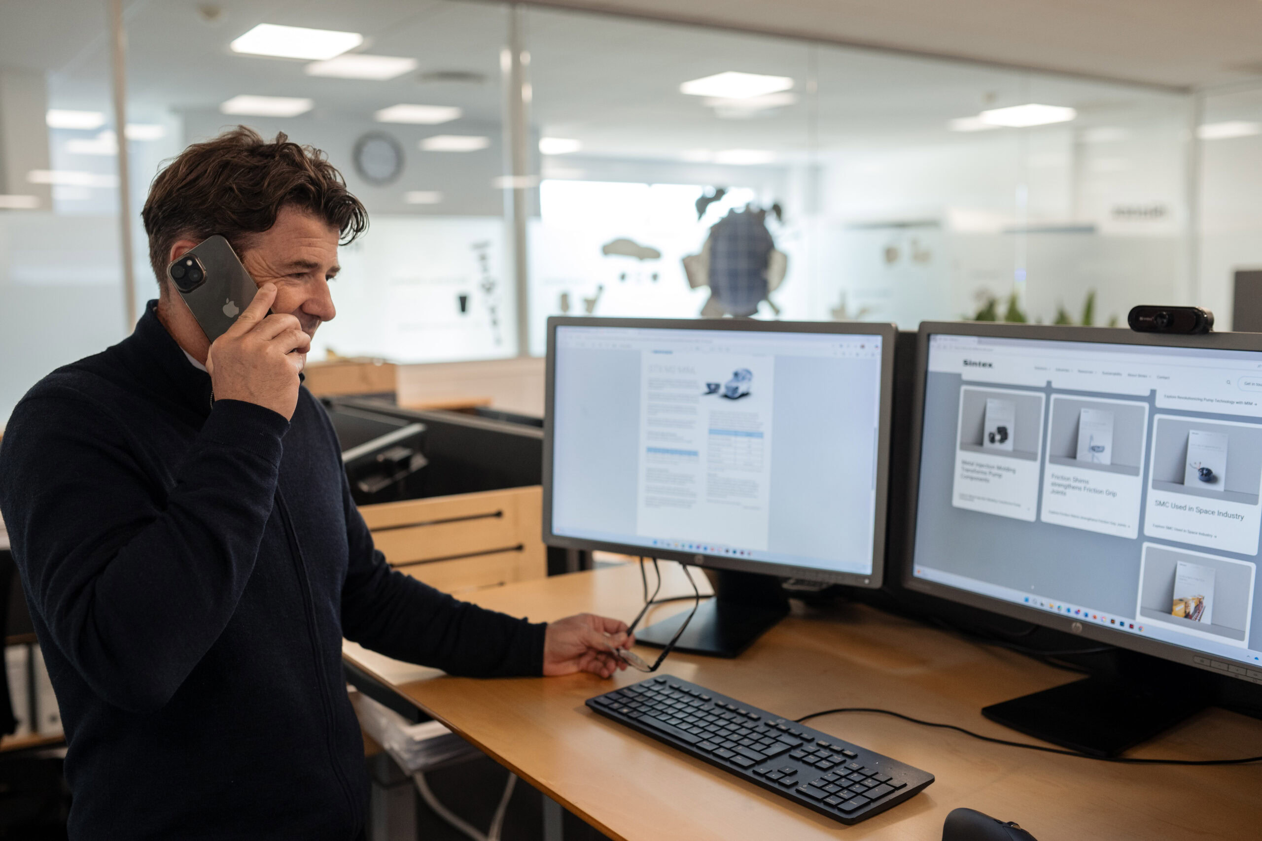 Sintex employee talking on phone