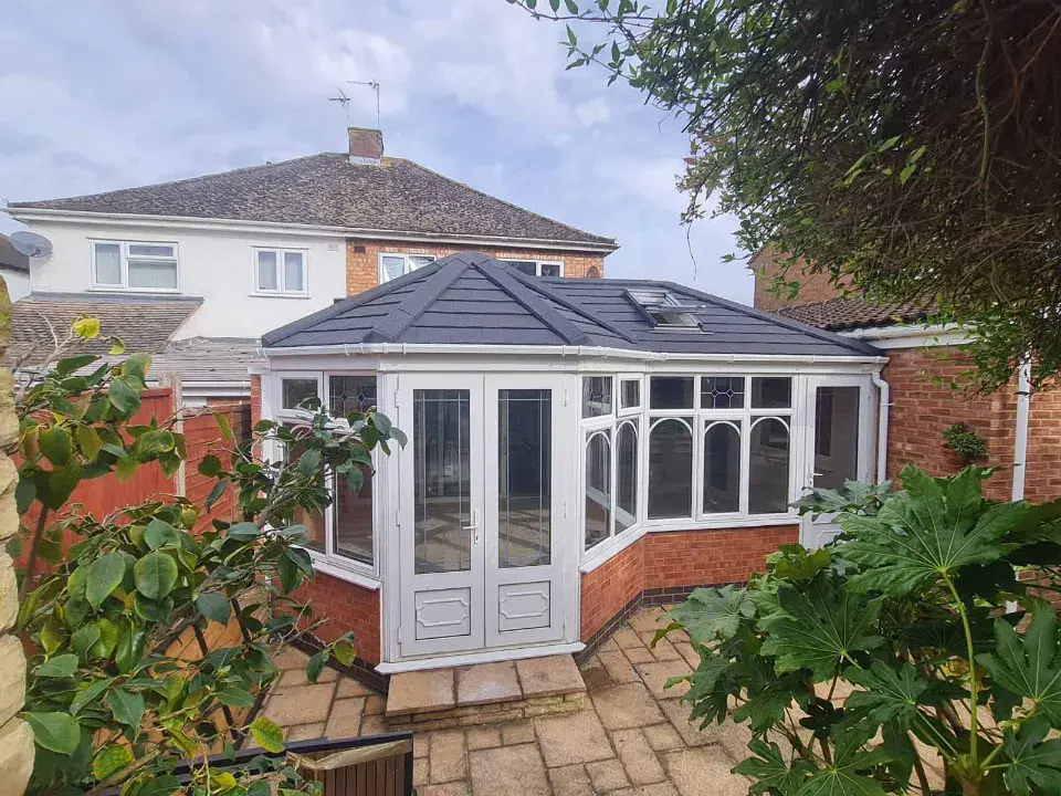 grey coloured p shaped conservatory