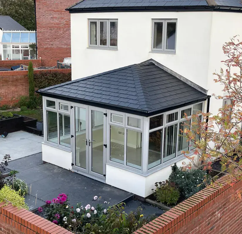 orangery with grey framed doors and windows