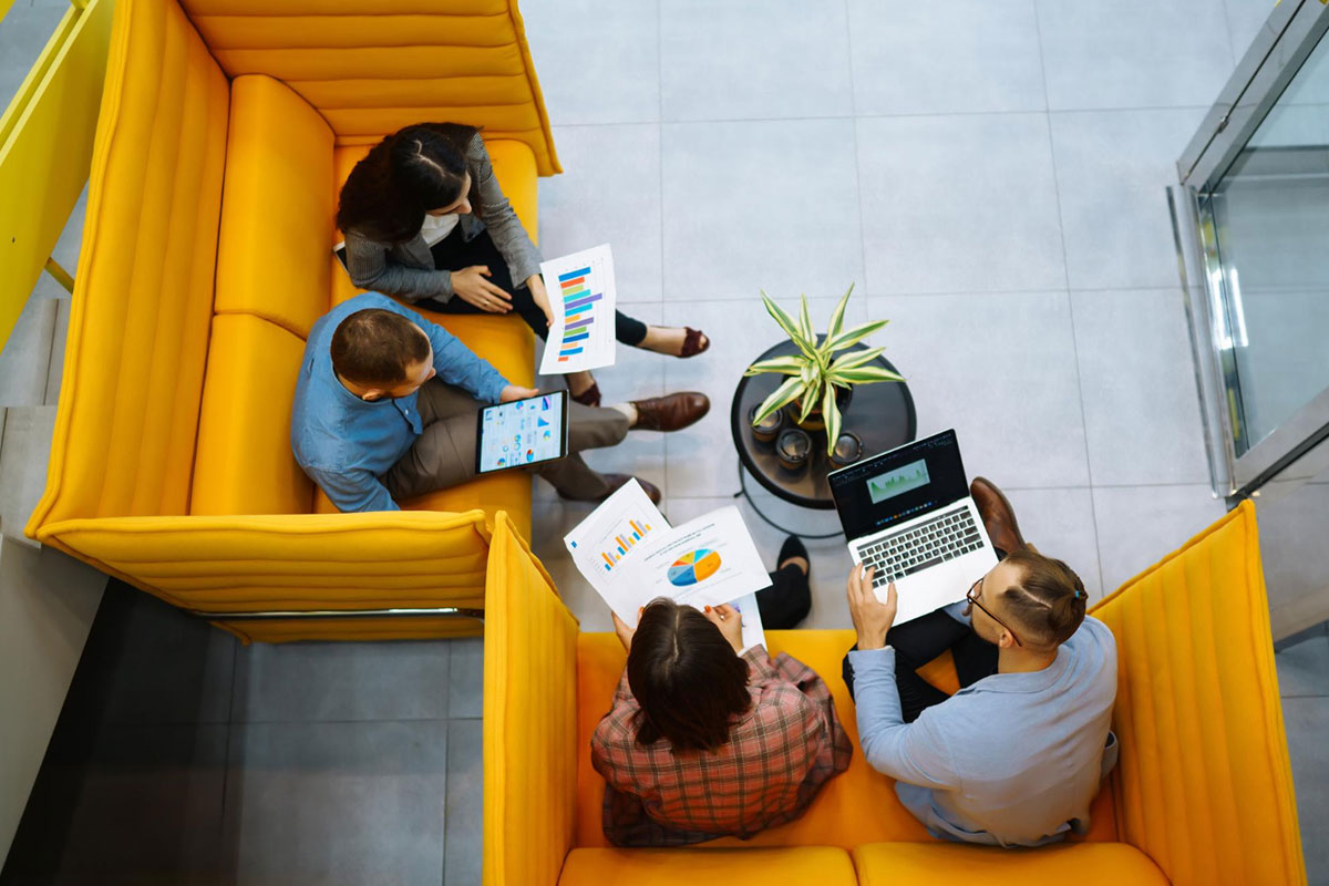 group of young businessmen working and communicating together