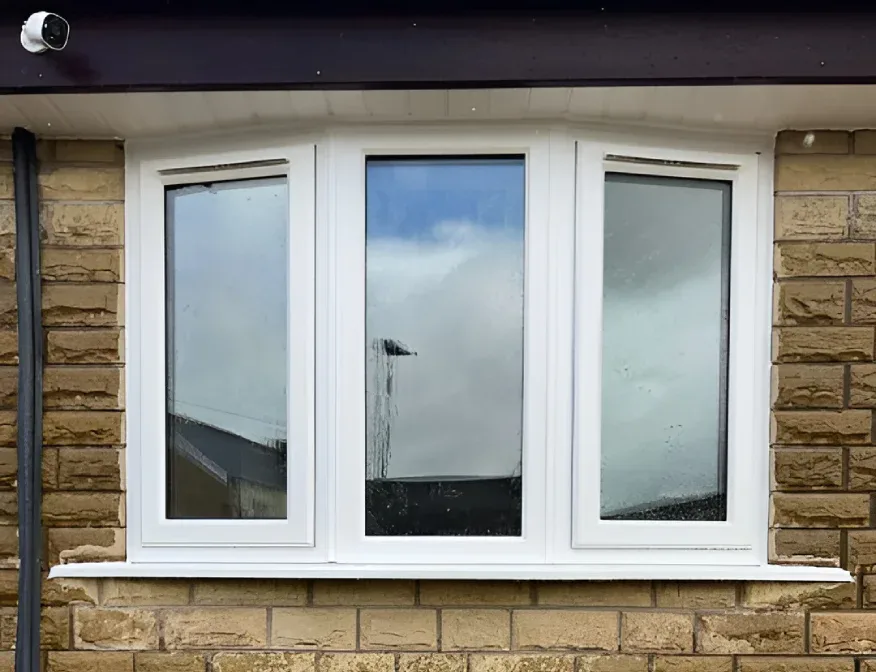 white framed bay window