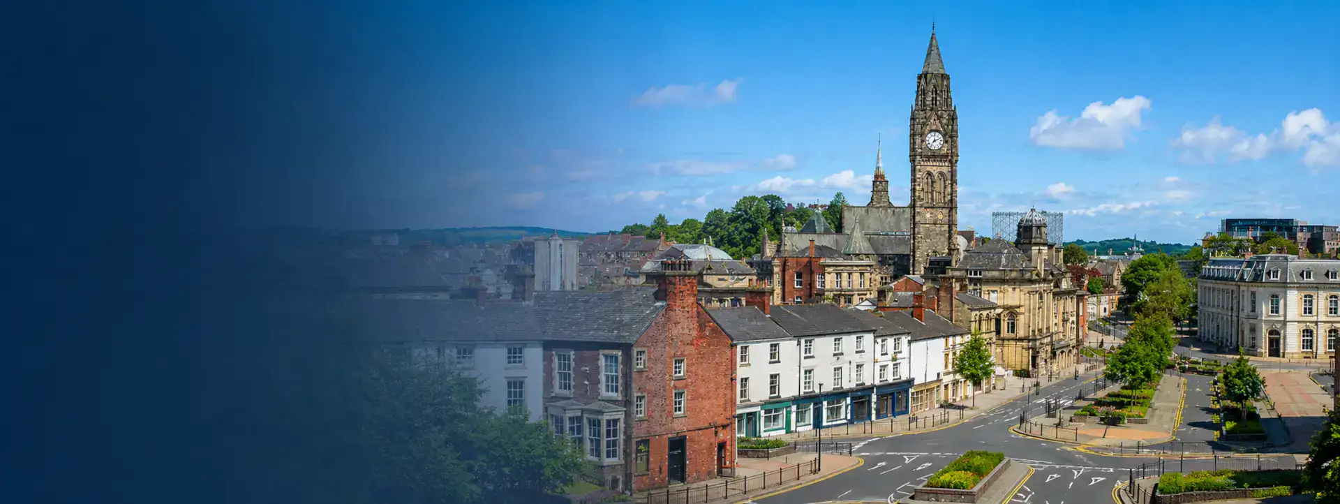 Home Improvements in Rochdale banner showing Rochdale town centre, historic buildings and clock tower on a sunny summer day.