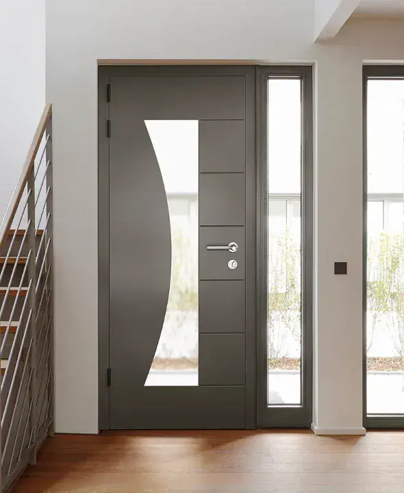 Smart Pimlico RAL7012 composite door with curved glazed panel and side light in modern hallway