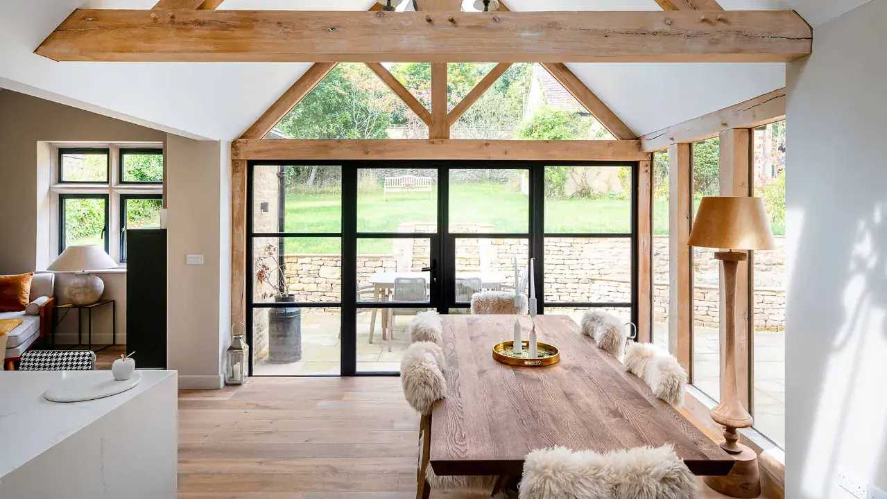 Steel-Look aluminium door with steel-look glazing opening from dining room to garden