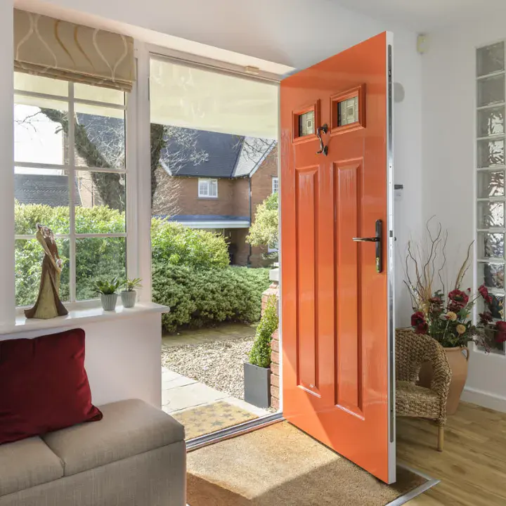 Solidor Berkeley 2 tangerine composite front door open into bright hallway with garden view