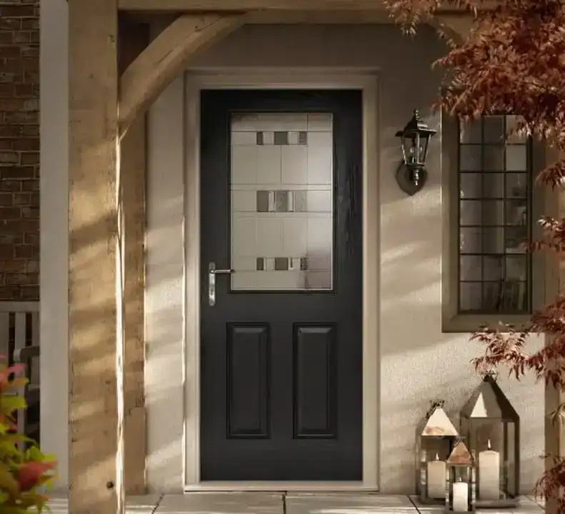 Black uPVC entrance door with a large decorative glazed panel