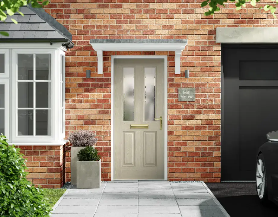 Cream composite front door with two glazed panels and brass hardware