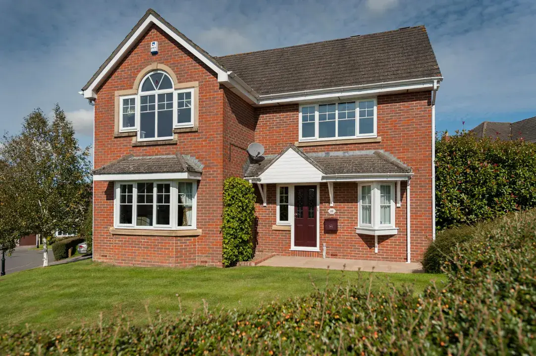 white-upvc-casement-windows-brick-house