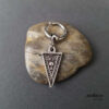 Ethnic triangle earring, antikuos, close-up