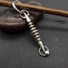 Time traveler, futuristic earring torpedo alternative earring by Antikuos jewellery, close-up
