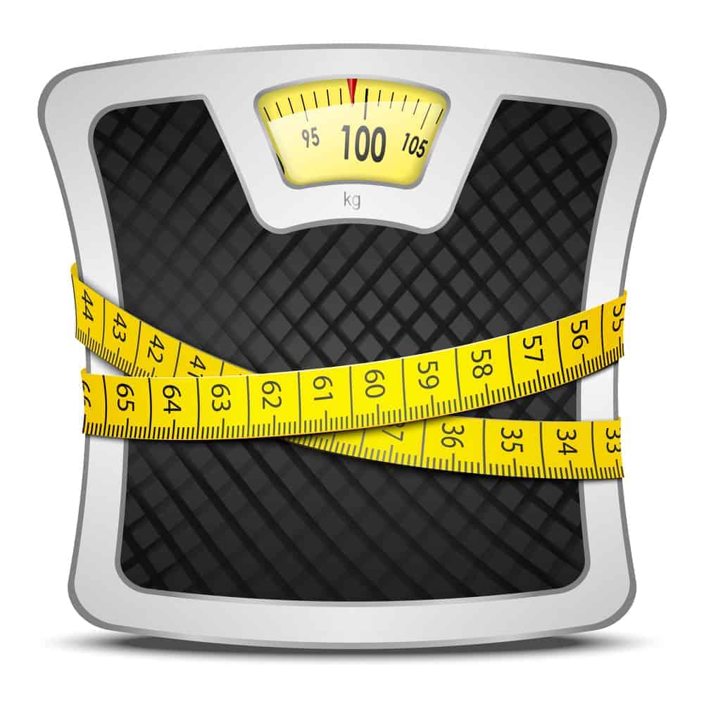 bathroom scales with a tape measure wrapped around them.
